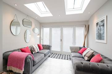 Comfy sofas off the kitchen.
