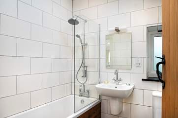 Bedroom One has a stylish en suite bathroom.
