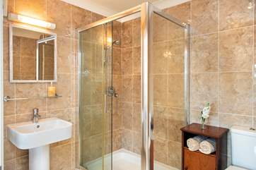 Bedroom 1 has an en suite shower-room.