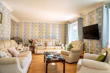 Plenty of room for all to relax in the comfy sitting-room.