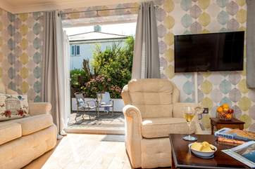 There are double doors leading from the lounge out to the garden.