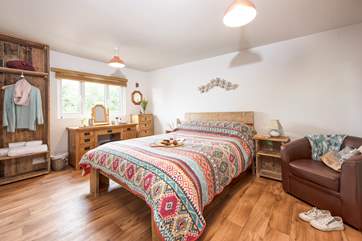 Both bedrooms are really well presented making the most of natural materials and colours that complement the setting.