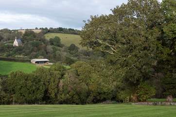It's quite a setting with far reaching views across to the charming village church.
