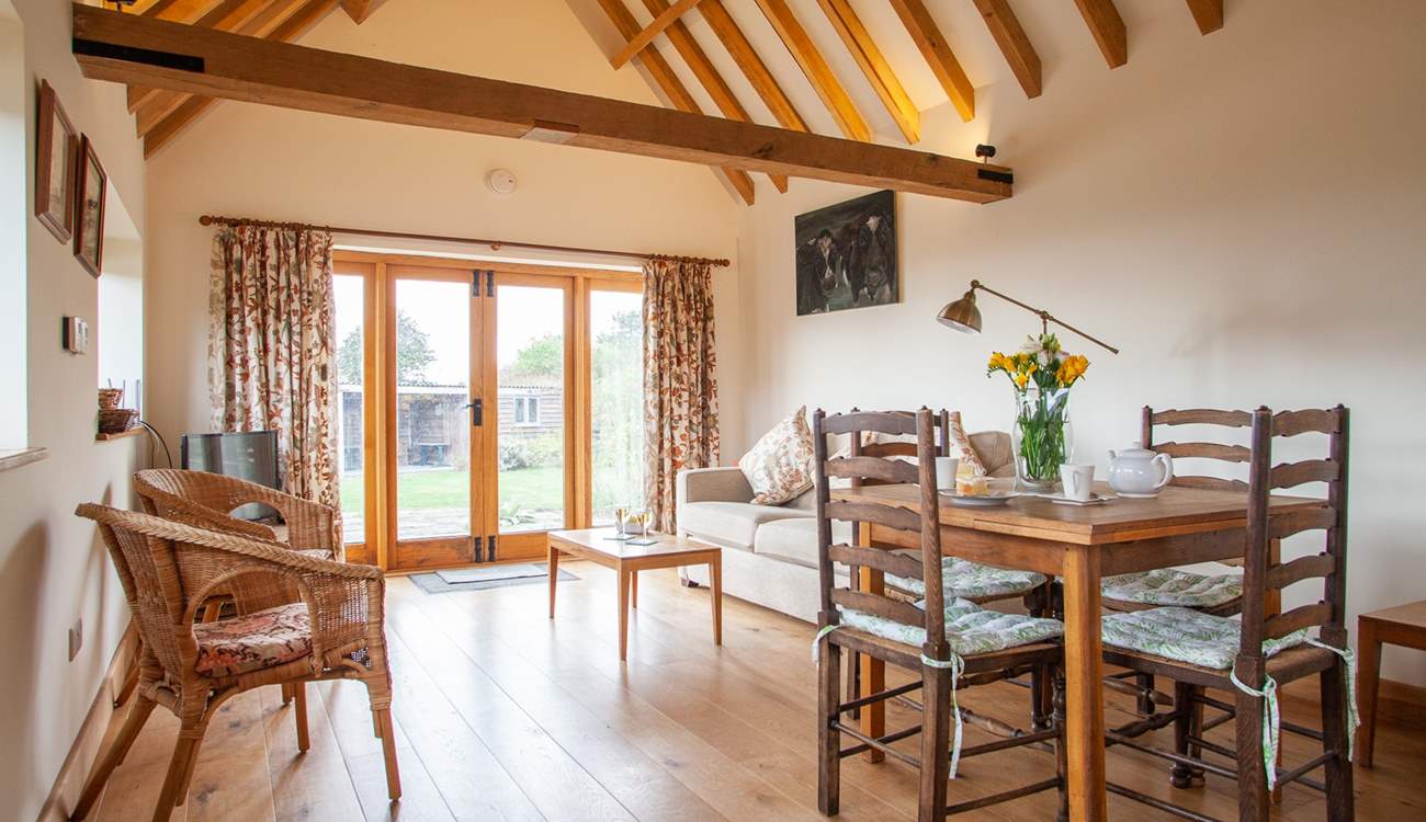 The double doors lead out onto the terrace and large private garden.