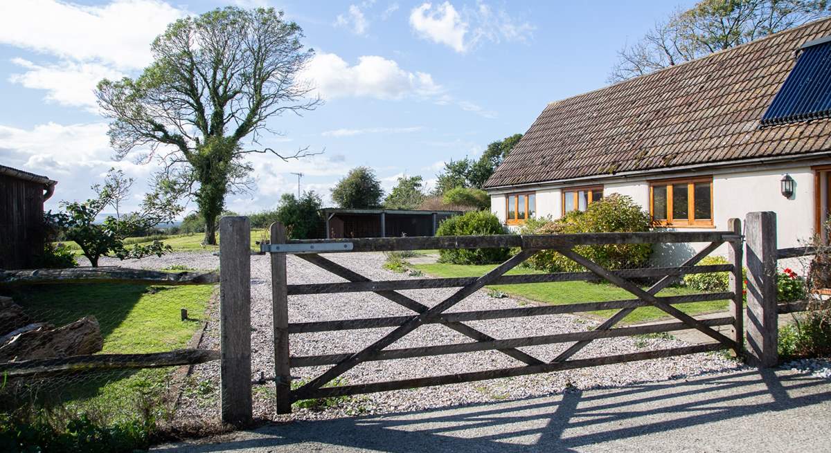 The entrance to Moorhen Cottage with gate that leads to a private garden and parking.