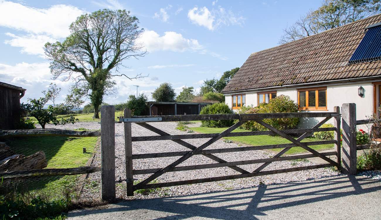 The entrance to Moorhen Cottage with gate that leads to a private garden and parking.