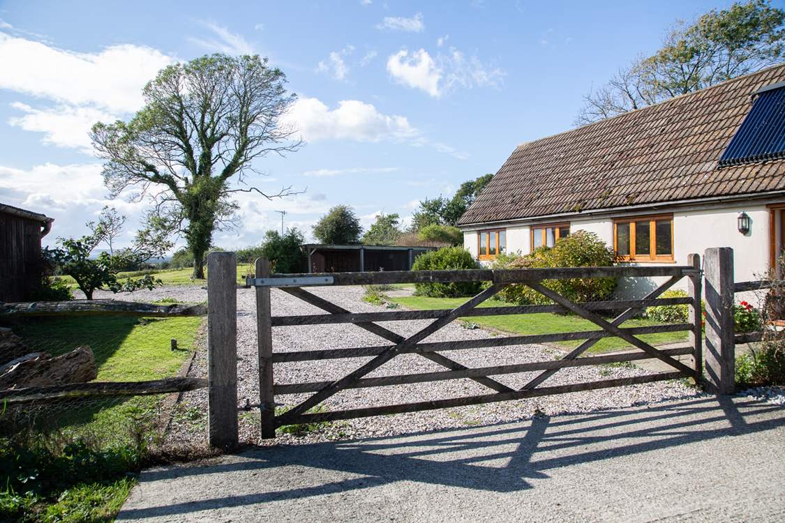 The entrance to Moorhen Cottage with gate that leads to a private garden and parking.