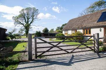 The entrance to Moorhen Cottage with gate that leads to a private garden and parking.