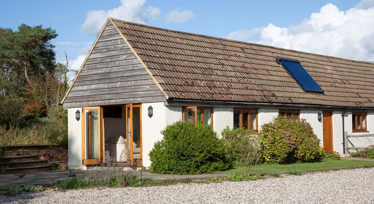 Double doors into the spacious and open plan living area.