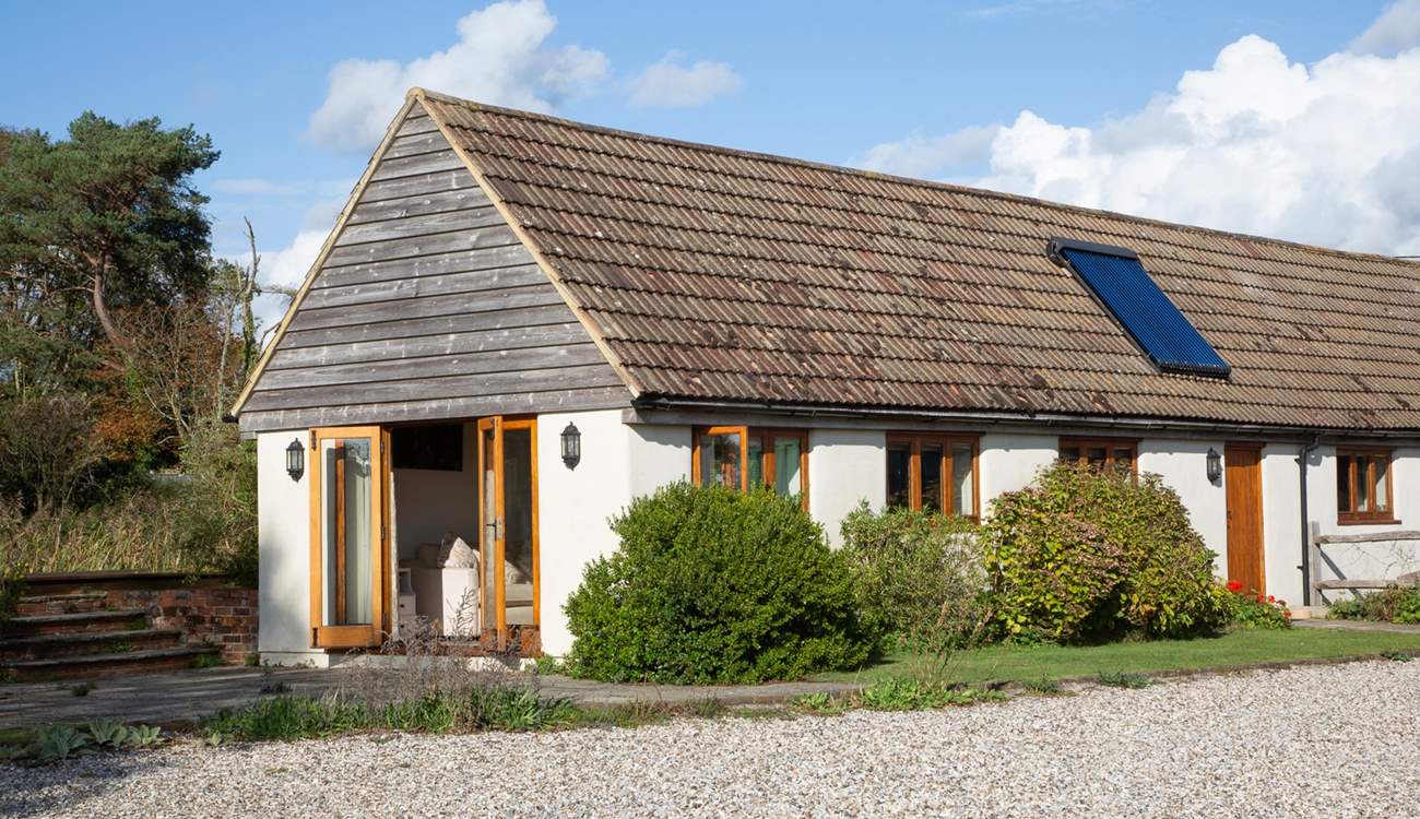 Double doors into the spacious and open plan living area.