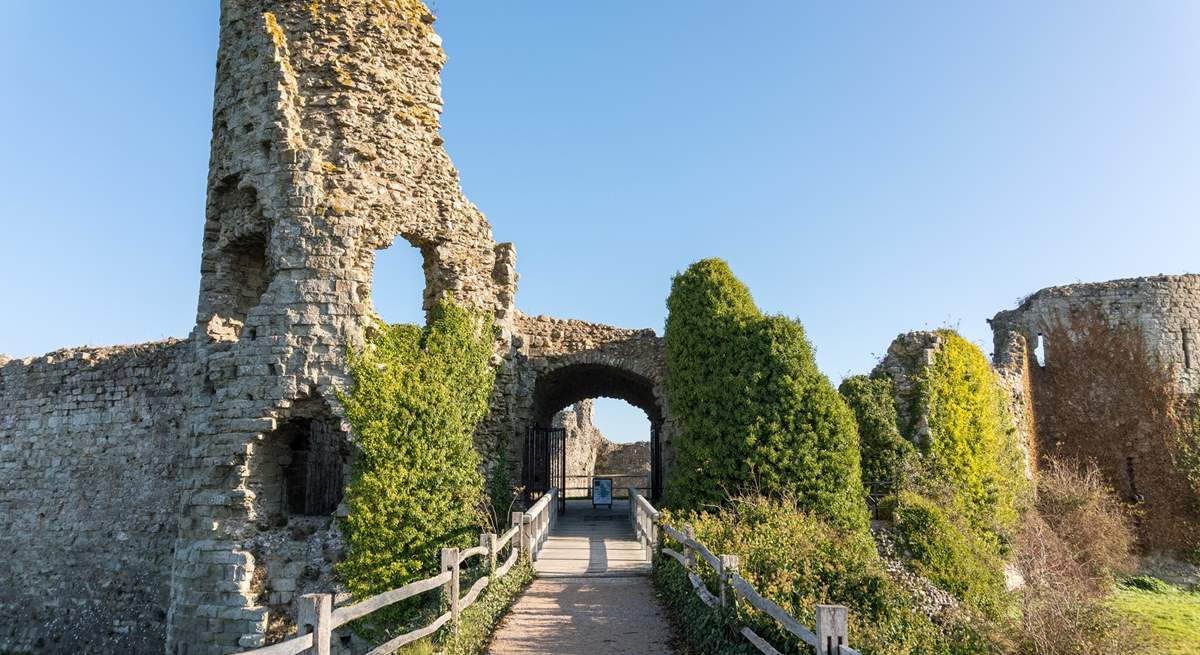 Walk the outer walls of Pevensey Castle.