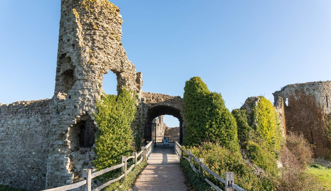 Walk the outer walls of Pevensey Castle.