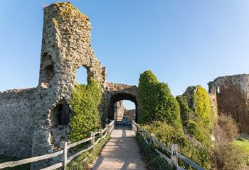 Walk the outer walls of Pevensey Castle.