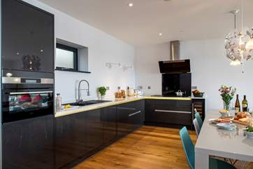 The stylish kitchen is beautifully appointed.