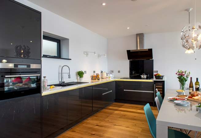 The stylish kitchen is beautifully appointed.