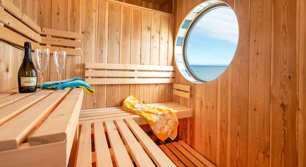 Look out over the sea as you sip some bubbles and enjoy the sauna.