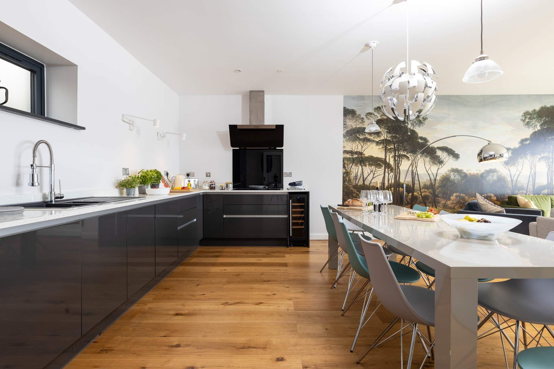 The stylish kitchen is beautifully appointed