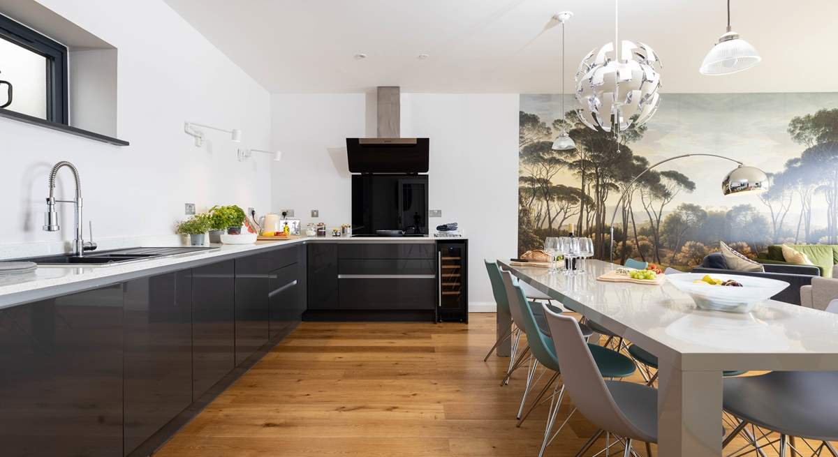 The stylish kitchen is beautifully appointed