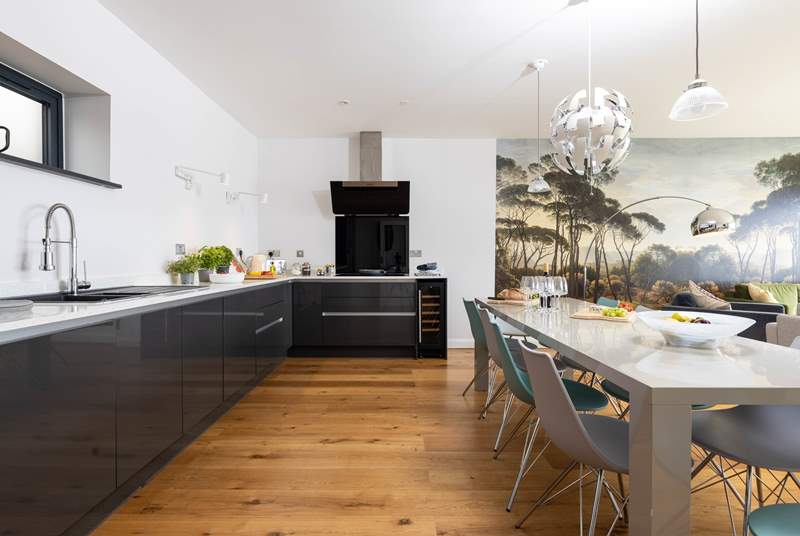 The stylish kitchen is beautifully appointed