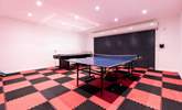 The garage is set up as a games-room offering table-tennis and table-football.  - Thumbnail Image