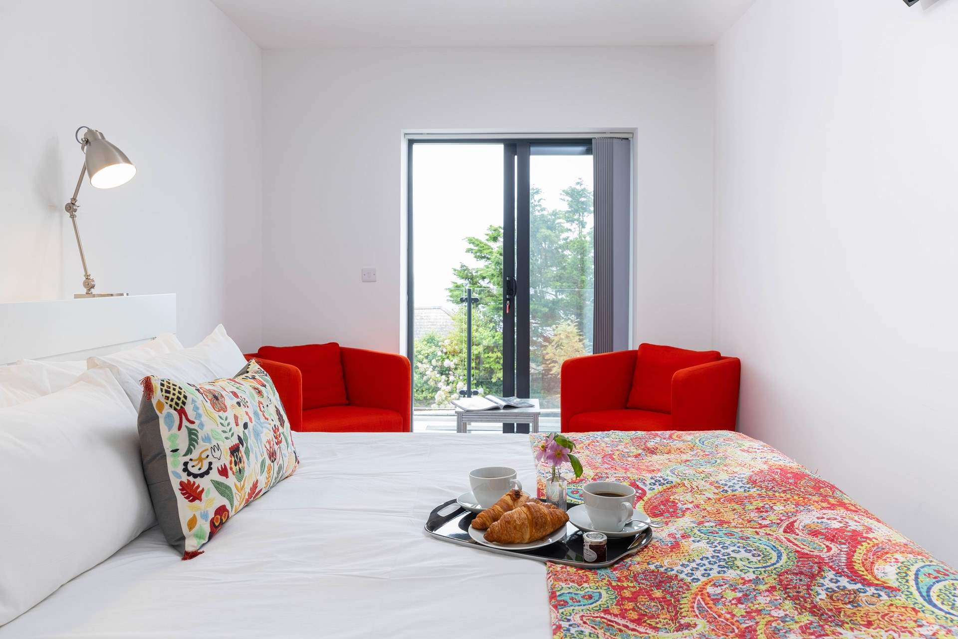 The balcony is shared with Bedroom 3 