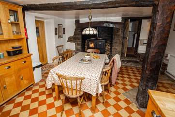 The kitchen is fully equipped, with a washing machine and tumble-drier located in the utility-room, situated to the side of the kitchen with a second door to the garden.