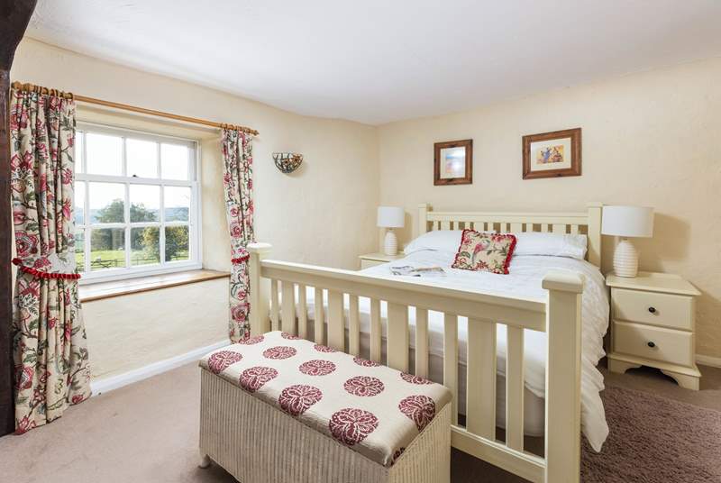 The main bedroom is at the front of the house and has delightful views of the countryside, best enjoyed from taking a seat in the window.