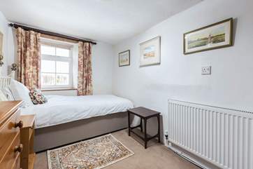 The downstairs single sits opposite the ground floor shower-room, please note that this part of the house is not on one level.