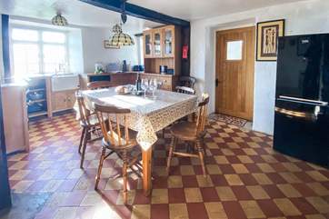 The dining-table sits in the middle of the kitchen and can comfortably sit seven making this the perfect spot to start and end the day.