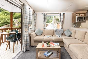 Take a seat on the sofa, or on the decking and simply enjoy being surrounded by nature!