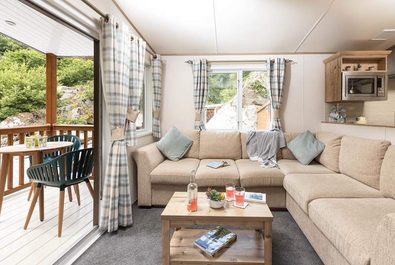 Take a seat on the sofa, or on the decking and simply enjoy being surrounded by nature!