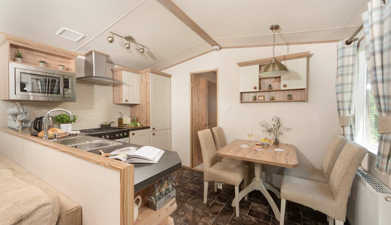 The spacious open-plan kitchen is perfect for young families. 