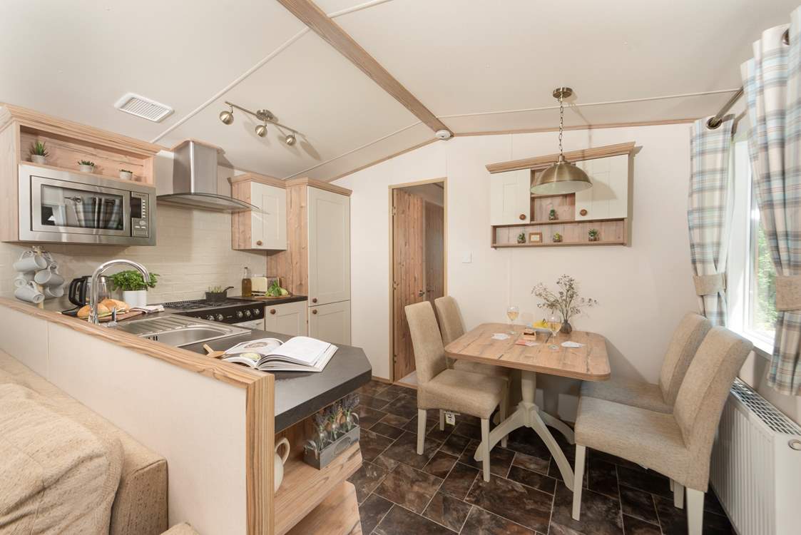 The spacious open-plan kitchen is perfect for young families.