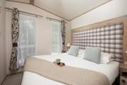 You'll find a comfy double bed in the main bedroom.
