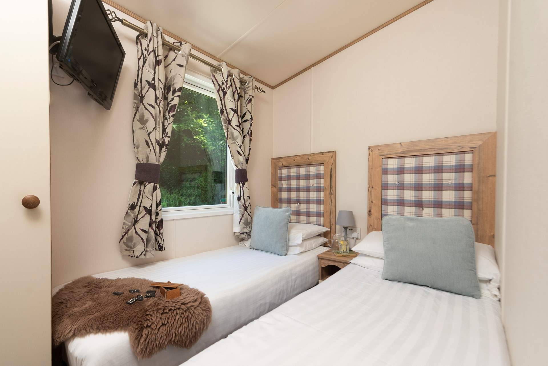 The second bedroom is perfect for little ones as it has small twin beds (2'3'' suitable for children), plus a TV/DVD player.