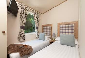 The second bedroom is perfect for little ones as it has small twin beds (2'3'' suitable for children), plus a TV/DVD player.