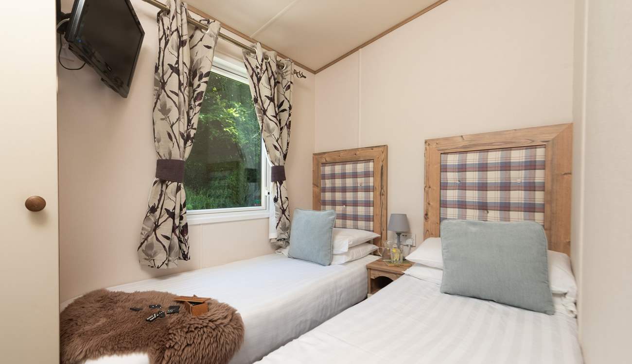 The second bedroom is perfect for little ones as it has small twin beds (2'3'' suitable for children), plus a TV/DVD player.