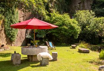 The impressive table was carved from an old millstone. 