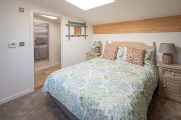 Sumptuous king-size bed to fall into after a day of adventure.
