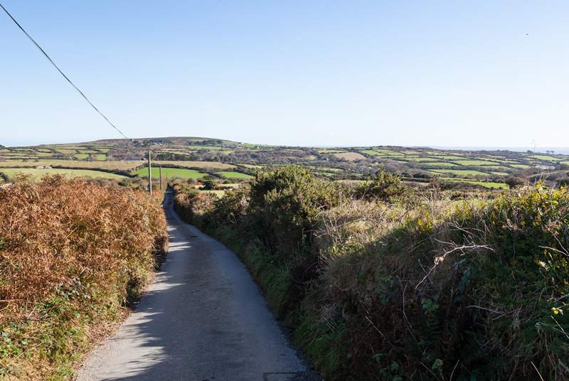 A typically narrow Cornish lane leads up to Woon Summer. 