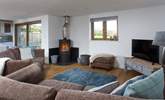 Snuggle up in front of the cosy wood-burner.  - Thumbnail Image