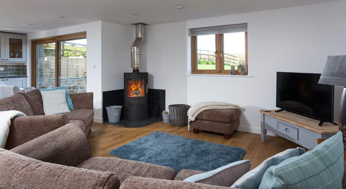 Snuggle up in front of the cosy wood-burner. 