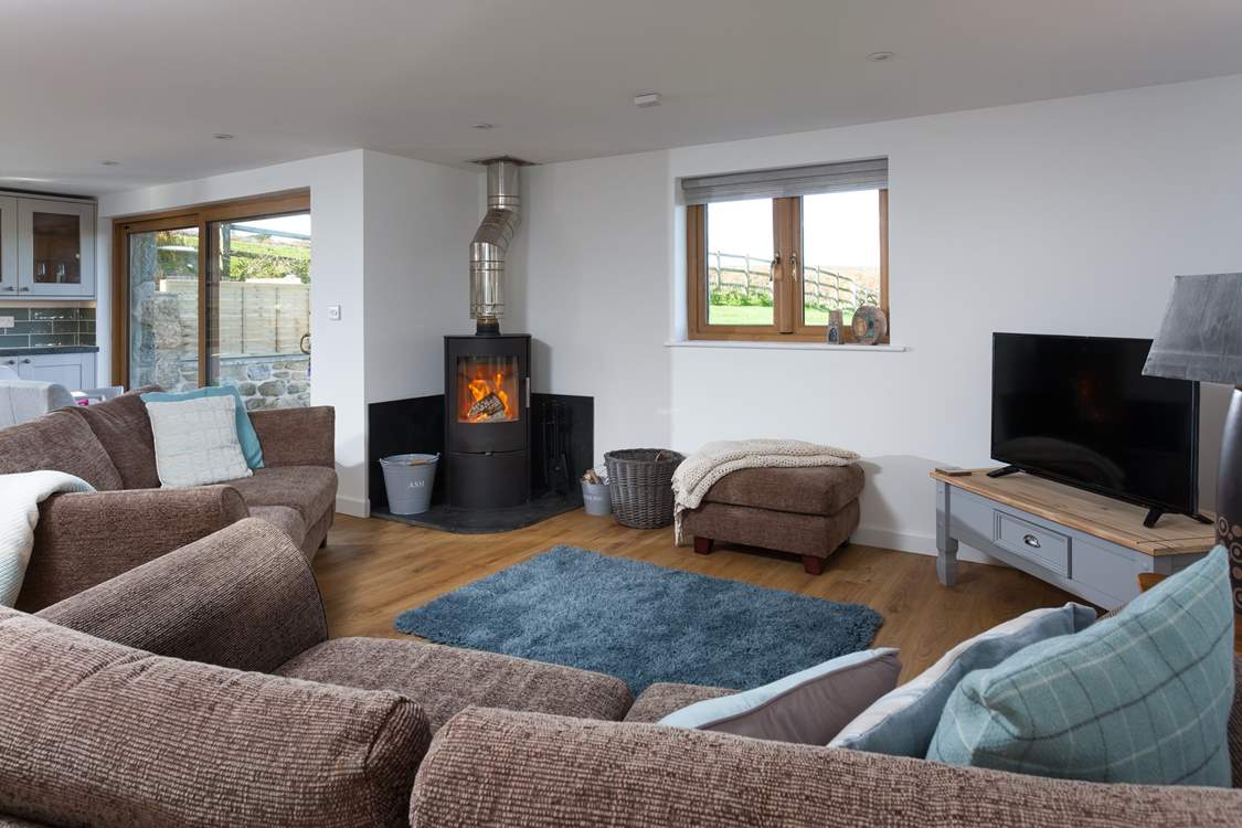 Snuggle up in front of the cosy wood-burner. 