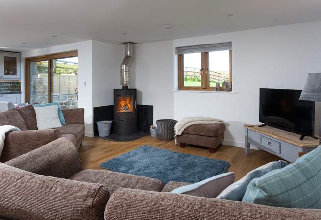 Snuggle up in front of the cosy wood-burner. 