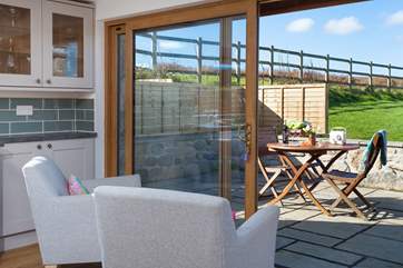 Open up the doors and step out onto the patio and enjoy the morning birdsong.