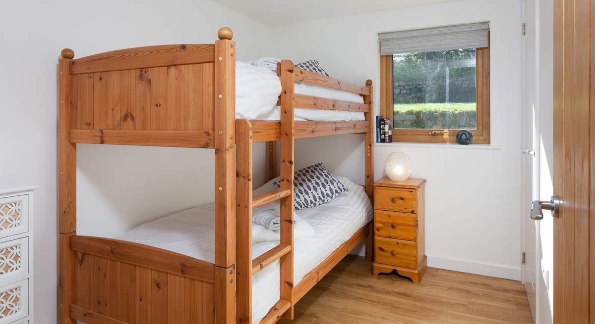 Bedroom 2 has three-foot bunk-beds. 