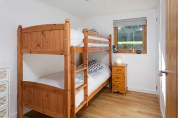 Bedroom 2 has three-foot bunk-beds.