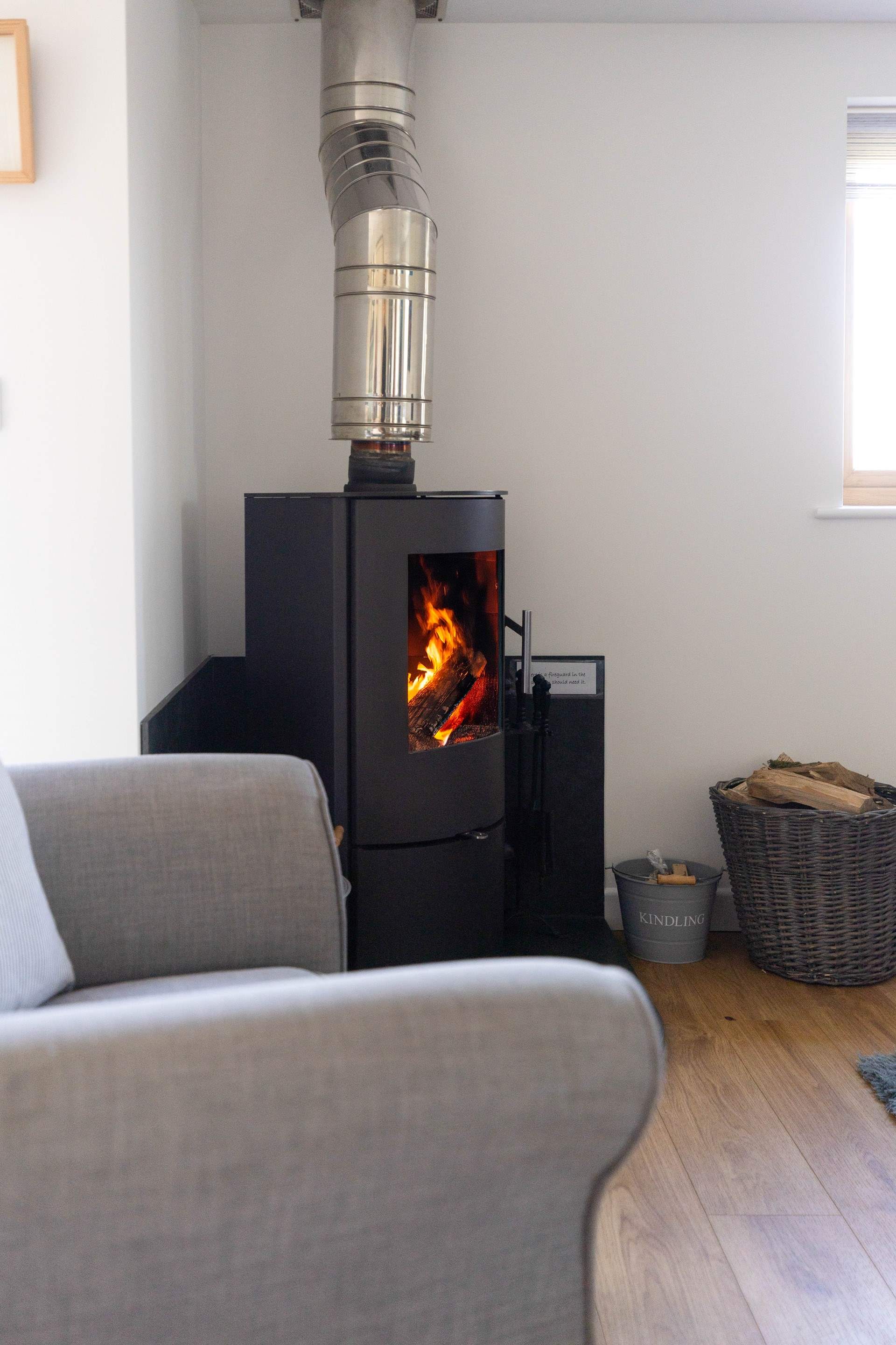 Snuggle up by the cosy wood-burner.