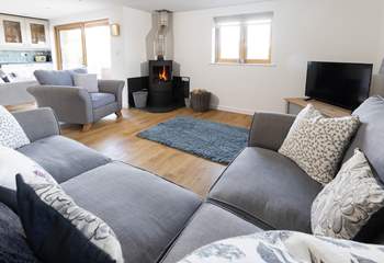 Snuggle up in front of the cosy wood-burner. 