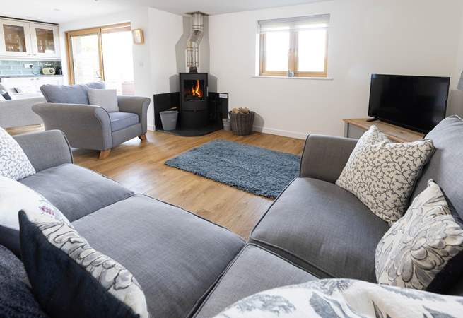 Snuggle up in front of the cosy wood-burner. 